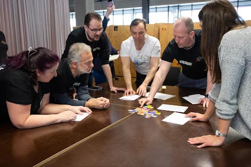 Group discussing about puzzle pieces