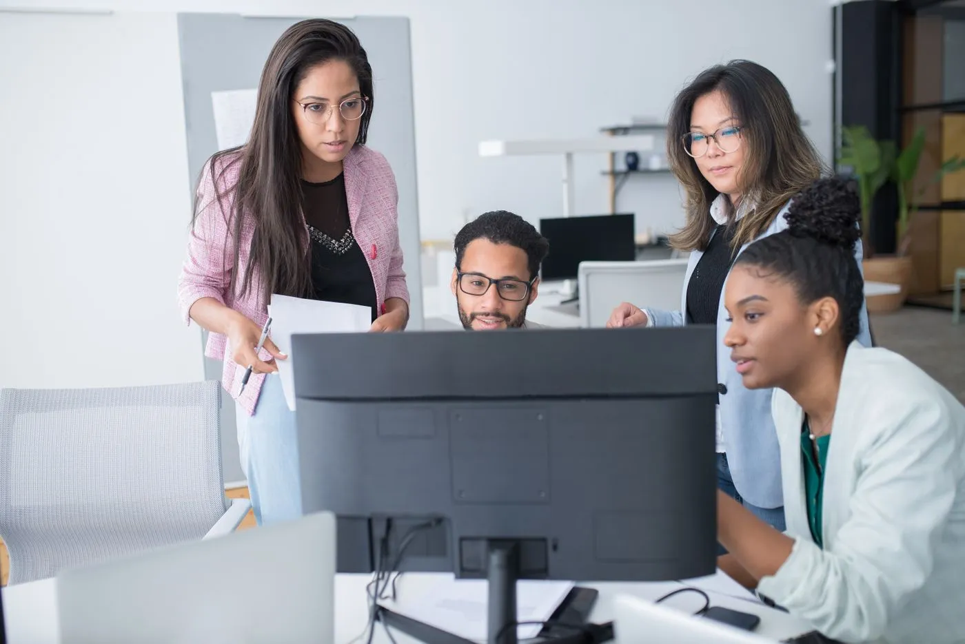 A team of developers building software together on open-source foundations