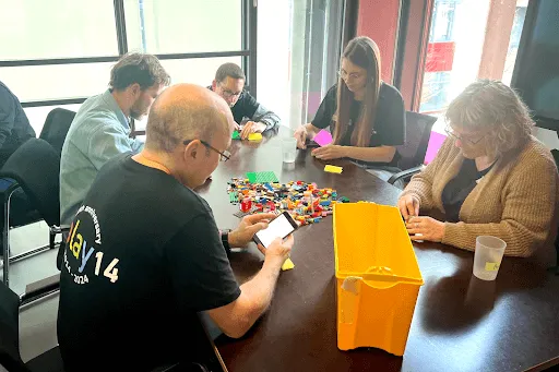 picture of attendees building with bricks
