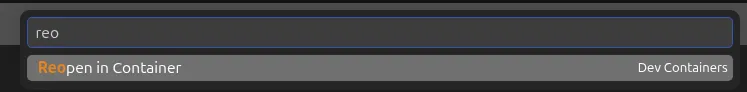 VS Code menu showing the Dev Containers "Reopen in Container" command